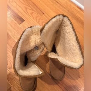 Size 7, UGG zip up boots. Fur lined. So cozy, just too tight for me.